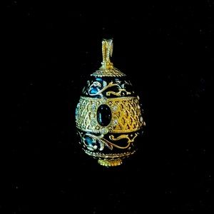 Joan Rivers “V” Fifth Anniversary black and gold enameled egg pendant necklace